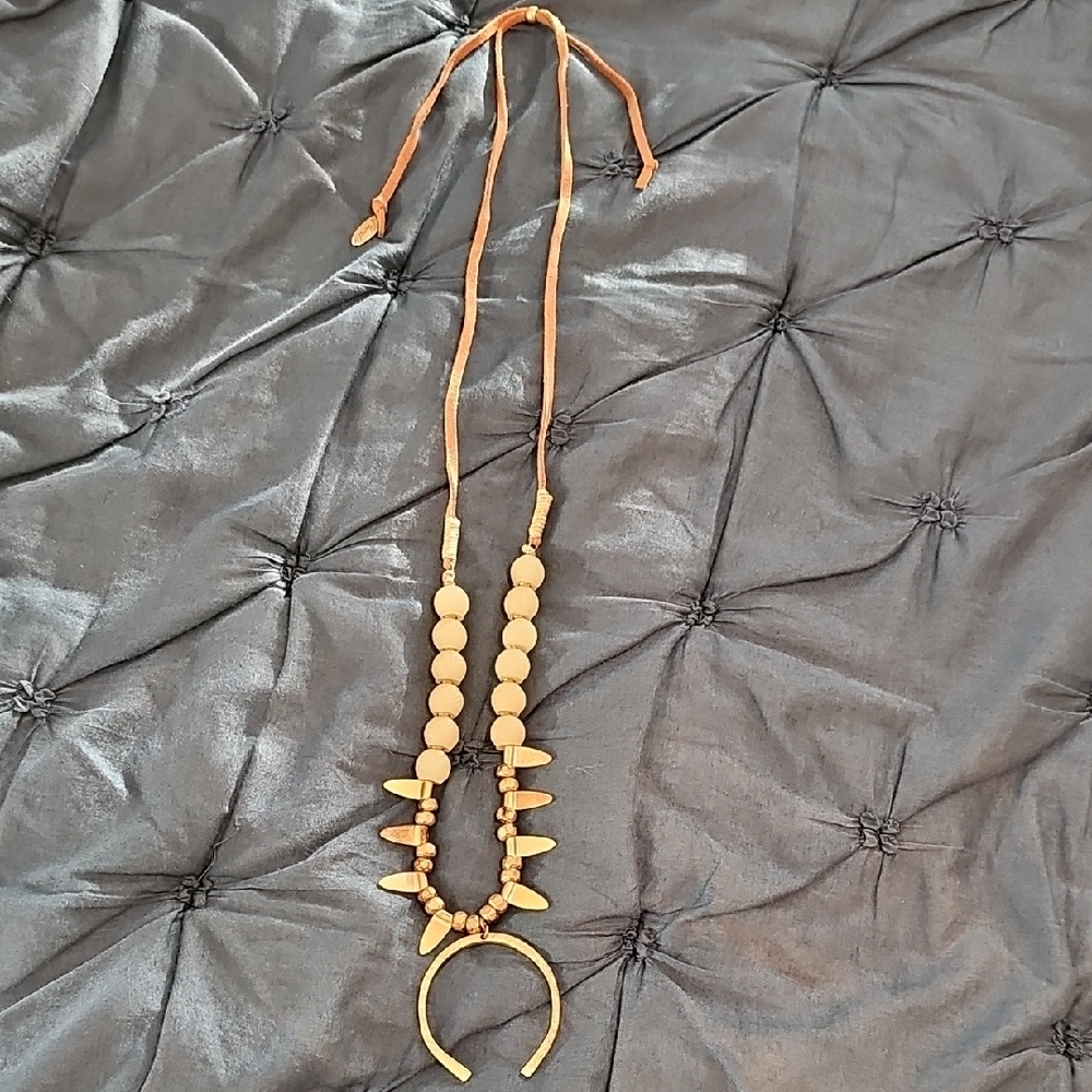 Gold Necklace with Crescent Pendant and Beaded Design